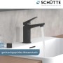 Schütte Waschtischarmatur Raven, schwarz-matt, mit laufendem Wasser im Waschbecken.