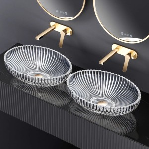 Zwei ovale Emke Aufsatzwaschbecken aus Klarglas mit geriffelter Oberfläche im modernen Bad.