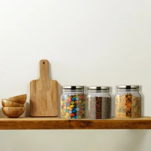 Relaxdays Vorratsgläser 3er Set, Glas mit Edelstahldeckel, luftdicht, gefüllt mit Süßigkeiten, Kaffee und Nudeln.