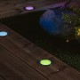 Paulmann Plug & Shine LED-Bodeneinbauleuchten mit RGBW-Funktion auf einer Holzterrasse.
