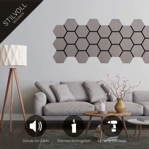 Graue Homestyle4u Akustikpaneele in Hexagonform als Wanddekoration im Wohnzimmer.