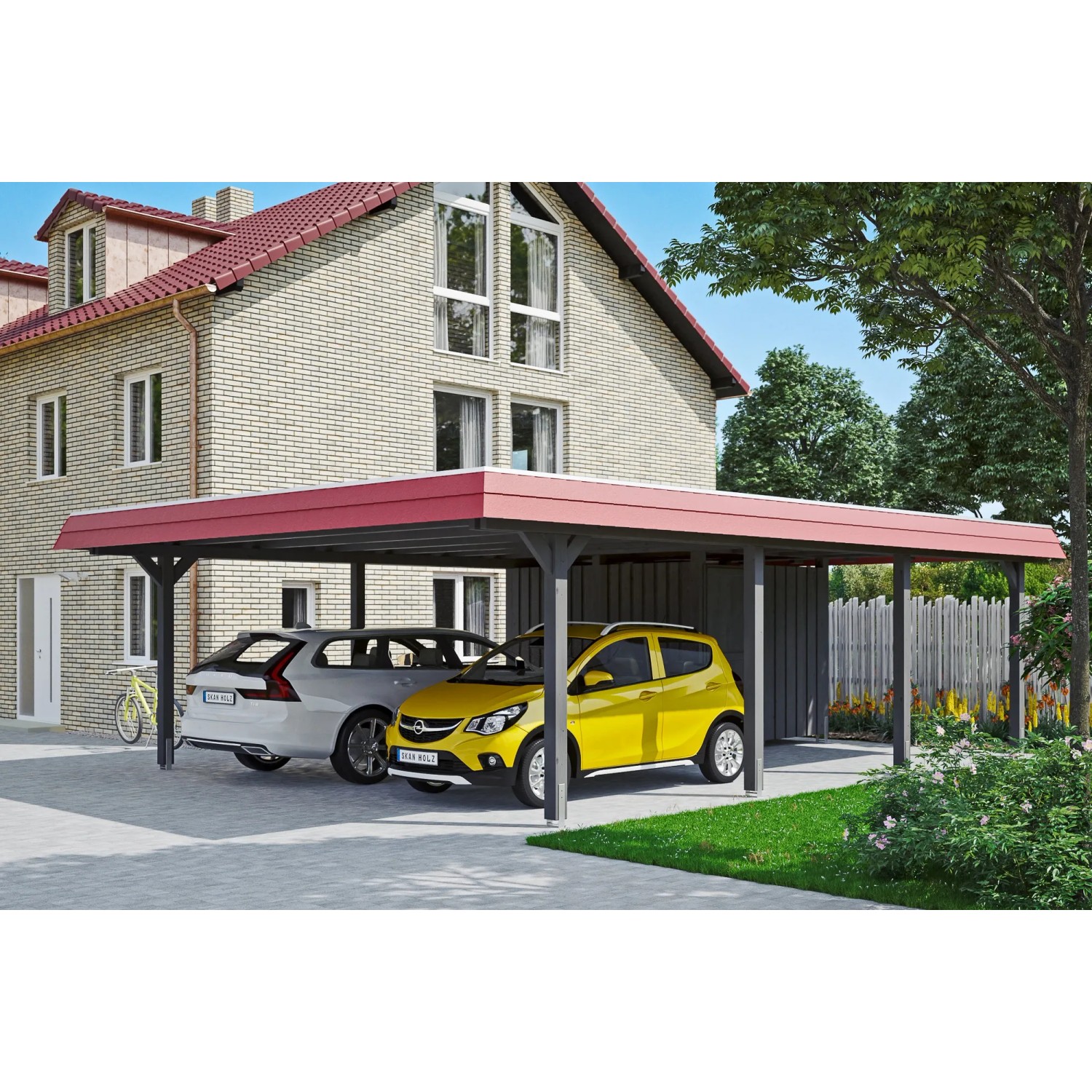Skan Holz Doppelcarport Wendland mit Anbau, schiefergraues Leimholz, rotes Aludach, zwei geparkte Autos.