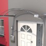 Modernes Bogenvordach BV/B in Edelstahloptik schützt den Eingangsbereich vor Wind und Wetter.