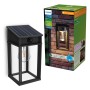 Schwarze Philips Solar-Wandleuchte Geri UltraEffizient mit Solarpanel und Bewegungsmelder.