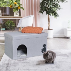 Graue Relaxdays Katzenhöhle mit Deckel, faltbar, als Sitzhocker nutzbar. Katze im Vordergrund.
