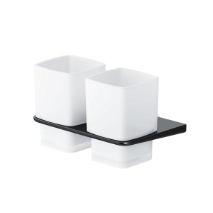 AM.PM Doppelglasbecher mit Wandhalterung Inspire V2.0 Schwarz. Zwei weiße Zahnputzbecher auf schwarzer Halterung.