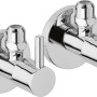 Zwei glänzende Eckventile aus Chrom für ein Handwaschbecken-Set.