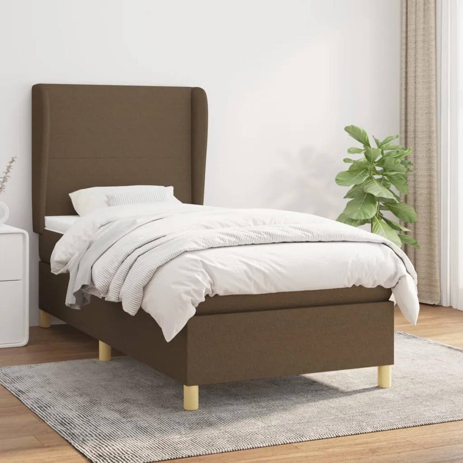 Dunkelbraunes Boxspringbett 100x200 cm mit Matratze und Stoffbezug.