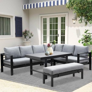 Schwarzes MeXo Aluminium Lounge-Set mit Esstisch und grauen Kissen für 8 Personen.
