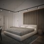 Schienensystem mit Ledvance Spot in Weiß-Gold über einem Schlafzimmer mit Bett und Holzpaneel.