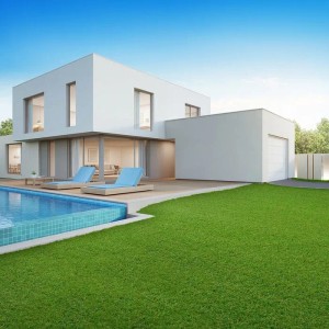 Kunstrasen Marbella 26mm vor modernem Haus mit Pool und Liegen im Garten.