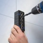LUX Bohrschablone im Einsatz mit Bohrer für präzise Löcher von 4 mm bis 12 mm.