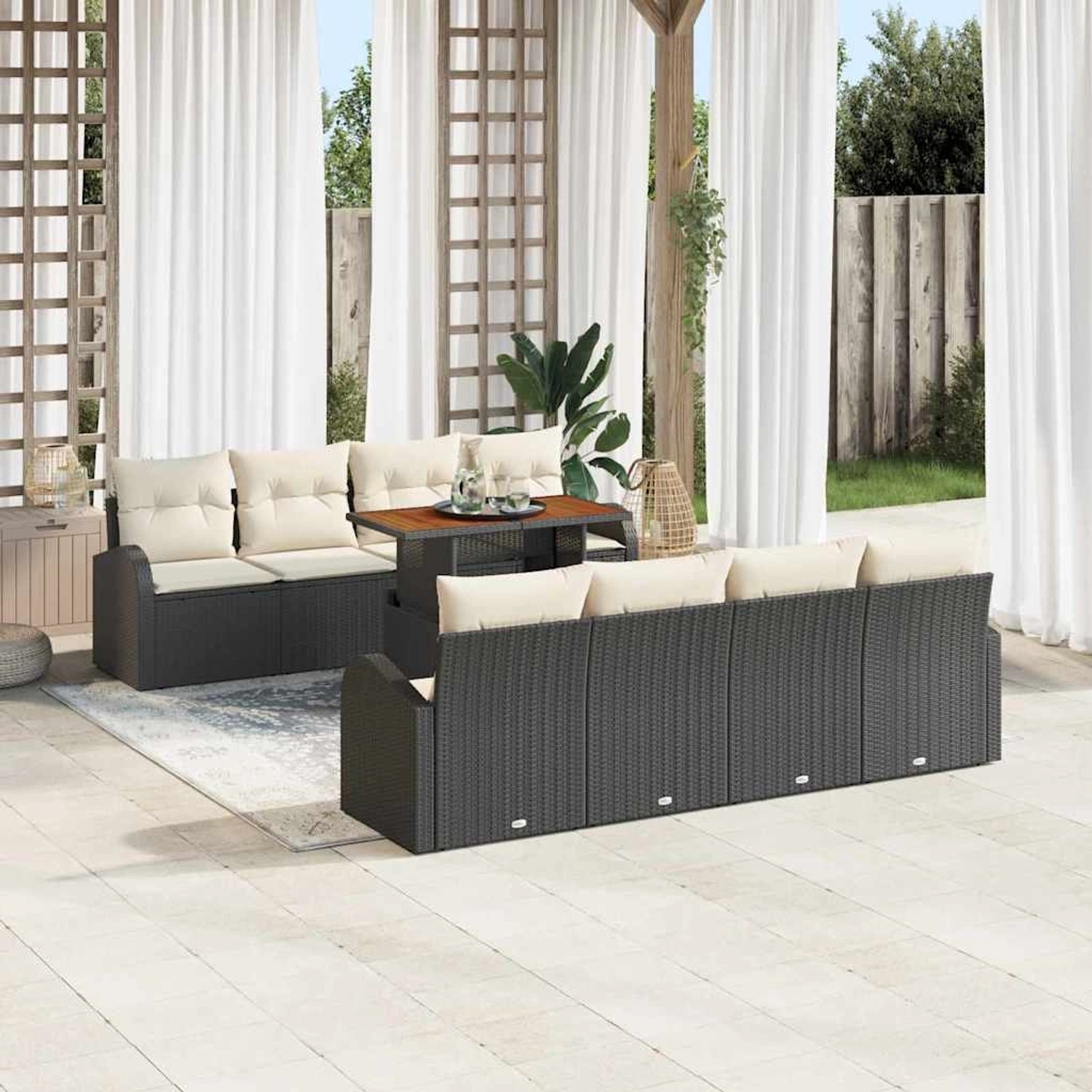 Schwarzes 9-teiliges vidaXL Garten-Sofa-Set aus Poly Rattan mit Tisch und Stauraum.