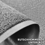 Detailaufnahme: Graue KARAT Spaghettimatte Fußmatte aus Vinyl mit rutschhemmender Unterlage.