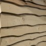 Detailansicht der naturbelassenen Holzfassade des weka Gartenhaus 820 A mit Theke.