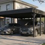 Anthrazitfarbener Skan Holz Flachdach-Carport Friesland mit integriertem Abstellraum, schützt zwei Autos.