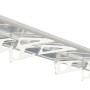 Weißes Palram Canopia Bordeaux 6.7 x 1.4 Vordach mit klarer Acrylglas-Eindeckung.
