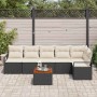 Schwarzes 7-teiliges Garten-Sofa-Set aus Poly Rattan mit Kissen und Tisch.