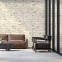Wohnraum mit Elabrick Verblender Sevilla in Beige/Braun. Wandverkleidung im Stein-Look.