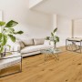 Wohnraum mit verlegtem, geöltem Parador Parkett Eiche Natur Landhausdiele 1-Stab.
