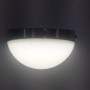 Lutec Solar-Außenwandleuchte Bubble aus Edelstahl, halbkugelförmig und leuchtend.