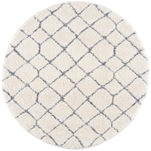 Runder, pastell-cremefarbener Hochflor Teppich Nara mit Rautenmuster, 160x160 cm.