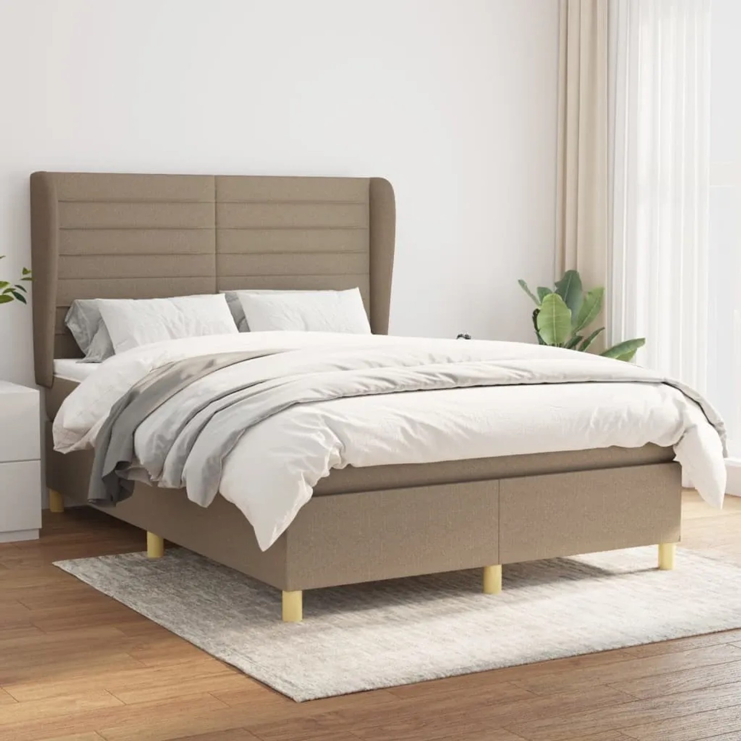 Boxspringbett Taupe (140x190 cm) mit Matratze und hohem Kopfteil.