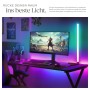 Schwarze Tectake LED Stehlampe Spectra mit Farbwechsel im Gaming-Zimmer.