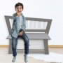 Axi Aufbewahrungsbank Corky grau-weiß mit Kind. Gartenbank mit Stauraum für Kinder.