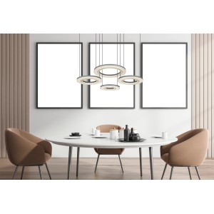 Moderne LED-Pendelleuchte Blasius mit schwarzen Ringen über Esstisch.