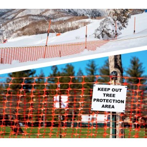 Oranger KARAT Absperrzaun Chester als Begrenzungszaun auf Schnee und zur Baustellenabsicherung.