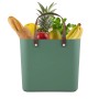 Grüne Rotho Multibag Albula Style 25L Aufbewahrungsbox mit Lebensmitteln.