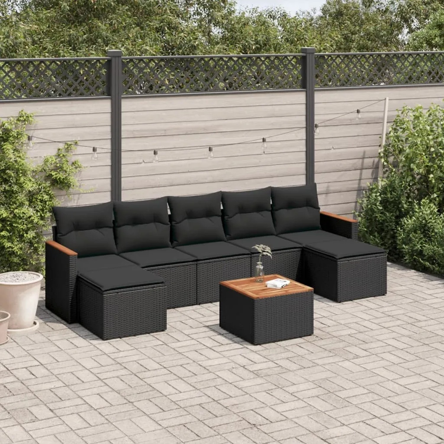 Schwarze 8-tlg. Garten-Sofagarnitur aus Polyrattan mit Kissen und Tisch für Terrasse & Garten.