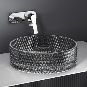 Rundes Emke Aufsatzwaschbecken aus schwarzem Glas mit Facettenmuster und Armatur.