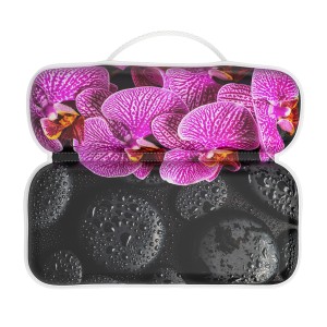 SANILO Badewannenkissen Madeira mit Orchideen- und Steinmotiv für entspannende Bademomente.