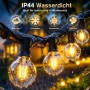 Salcar Solar G40 LED Lichterkette, warmweiß, mit Wassertropfen an einem Ast. IP44 wasserdicht für Außenbereich.