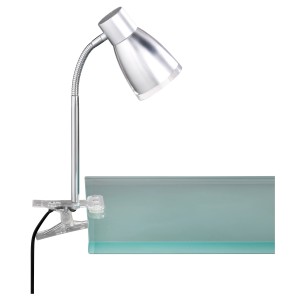 Graue LED-Klemmleuchte Jos mit flexiblem Arm und transparentem Schirm.