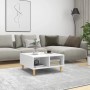 Weißer vidaXL Couchtisch mit Holzbeinen und zwei Ablagefächern im Wohnzimmer. Modernes Design.