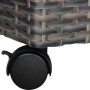 Detailaufnahme: Anthrazit-beiger Polyrattan Pflanzkasten mit feststellbarer Rolle.