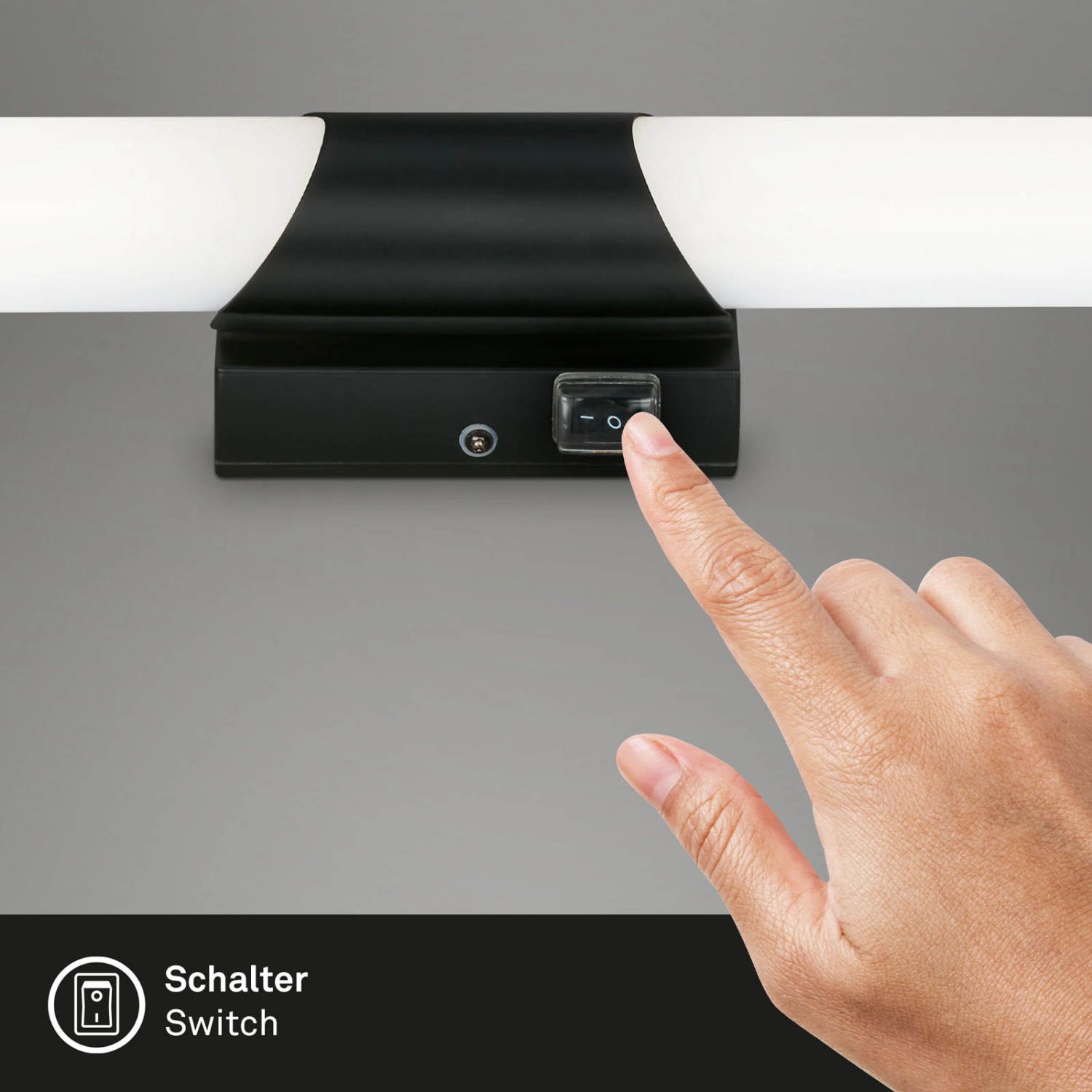 Brilo LED-Wandleuchte Klak Schwarz, 6,5 W, mit Finger am Schalter. Badleuchte für Innenräume.