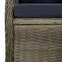 Nahaufnahme des braunen Poly Rattan Gartensessels mit schwarzem Sitzkissen. Die geflochtene Materialstruktur ist deutlich sichtbar.