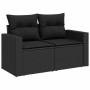 Schwarze 2-Sitzer Garten-Sofagarnitur aus Poly Rattan mit Kissen.