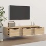 Wandschrank Sonoma-Eiche mit drei Schubladen, montiert im Wohnzimmer.