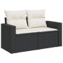 Schwarze vidaXL Garten-Sofagarnitur aus Rattan mit cremefarbenen Kissen.