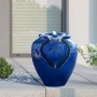 Blauer Teamson Home Gartenbrunnen in Topfform mit LED-Beleuchtung.
