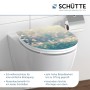 Schütte WC-Sitz Duroplast HG Magic Light mit Absenkautomatik und Motivdruck auf einer Toilette.