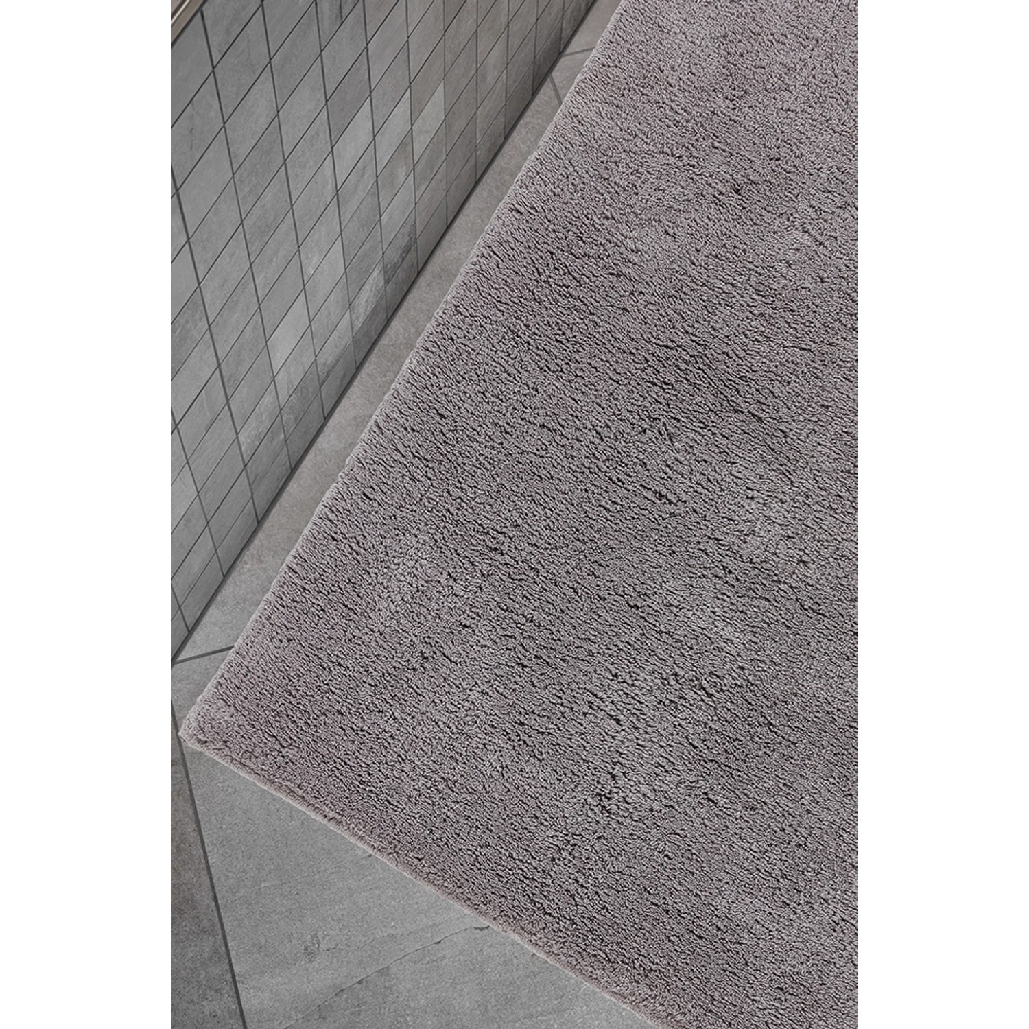 Schöner Wohnen Badteppich Bahamas, 60x90 cm, hellgrau, uni. Weicher Badvorleger für warme Füße im Badezimmer.