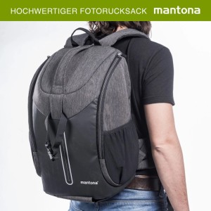 Mantona Fotorucksack Tallinn in Grau-Schwarz, von hinten getragen. Kamerarucksack mit gepolsterten Gurten für Komfort.