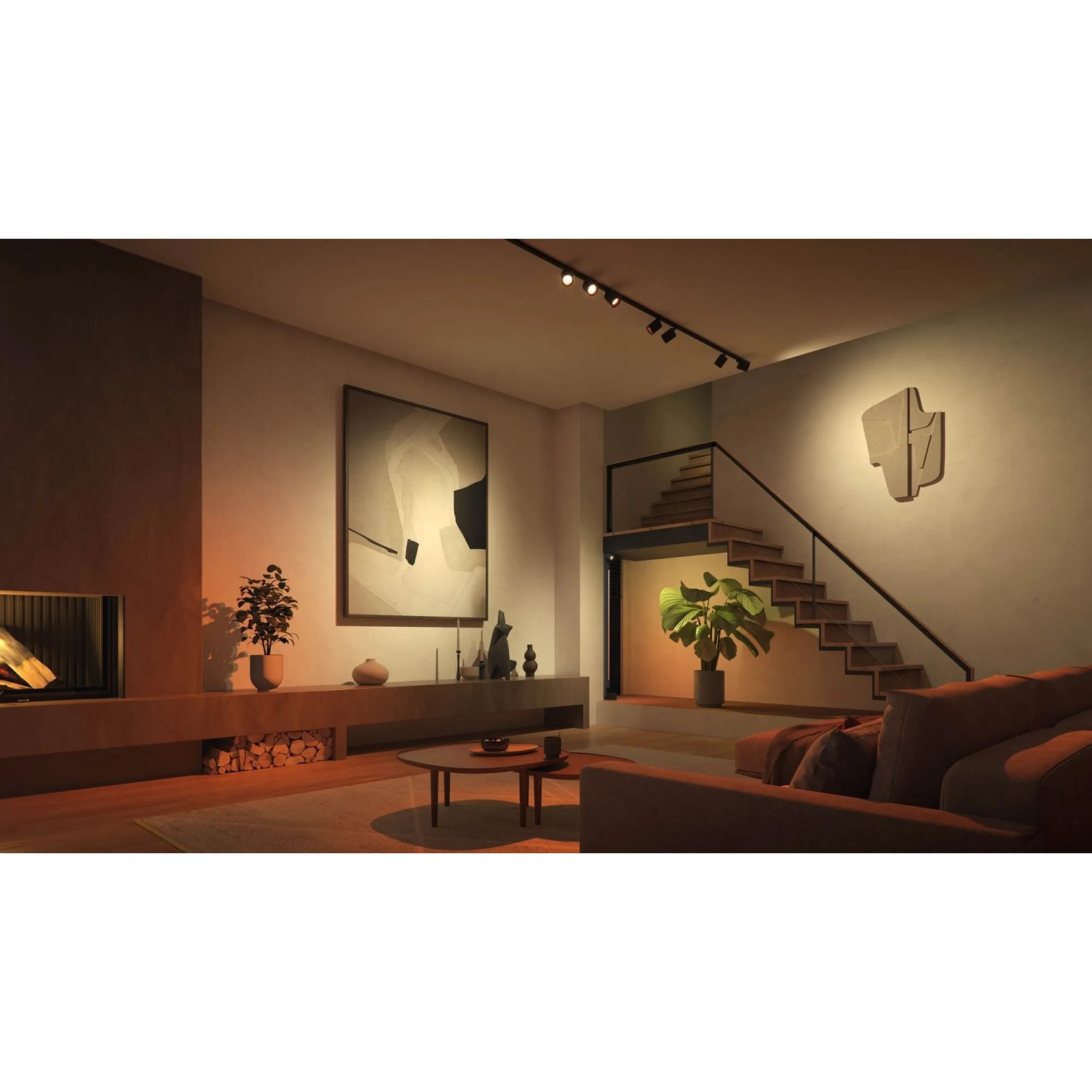Schwarze Philips Hue Perifo LED-Spots an Schiene im Wohnraum mit Ambiente-Beleuchtung.