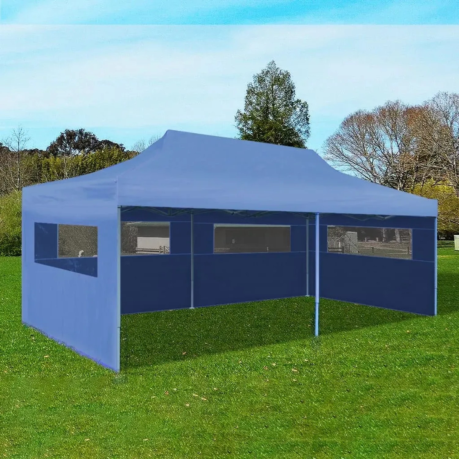 Blaues, faltbares 3x6 m vidaXL Partyzelt mit Seitenwänden und Fenstern auf einer Wiese.